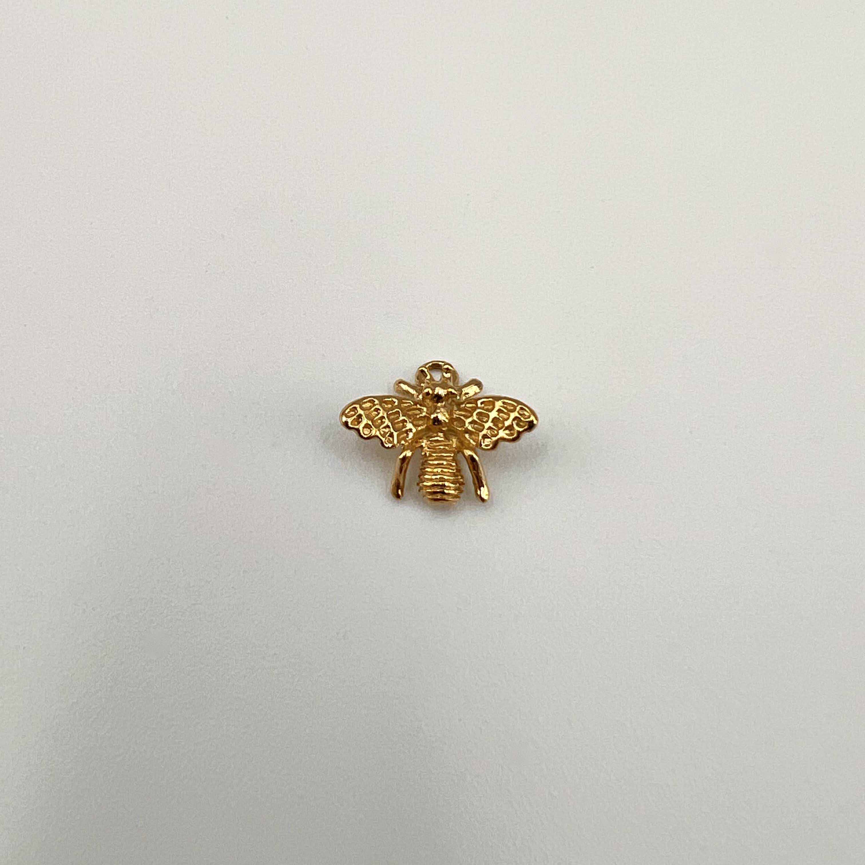 Abeille en acier doré