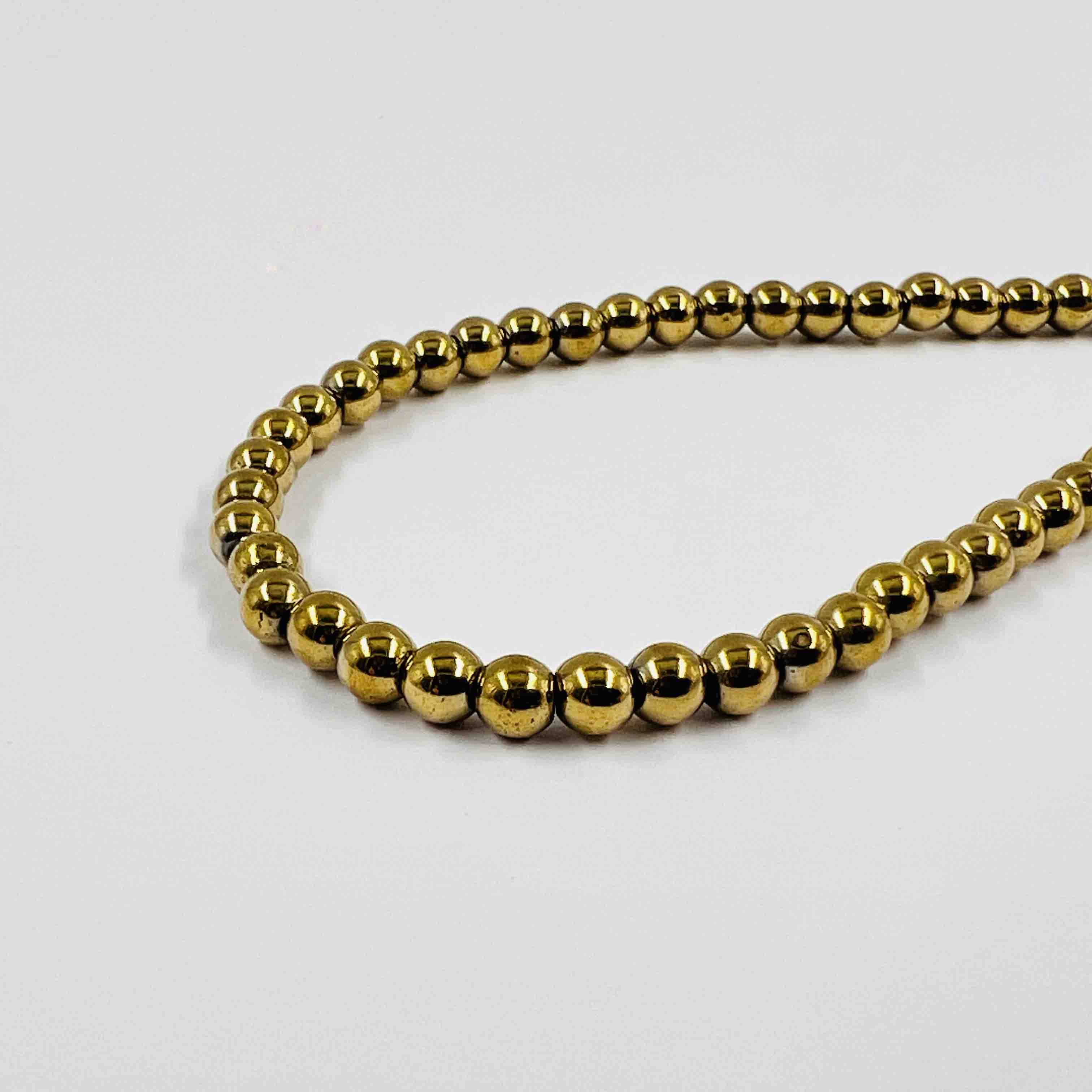 Boule hématite dorée