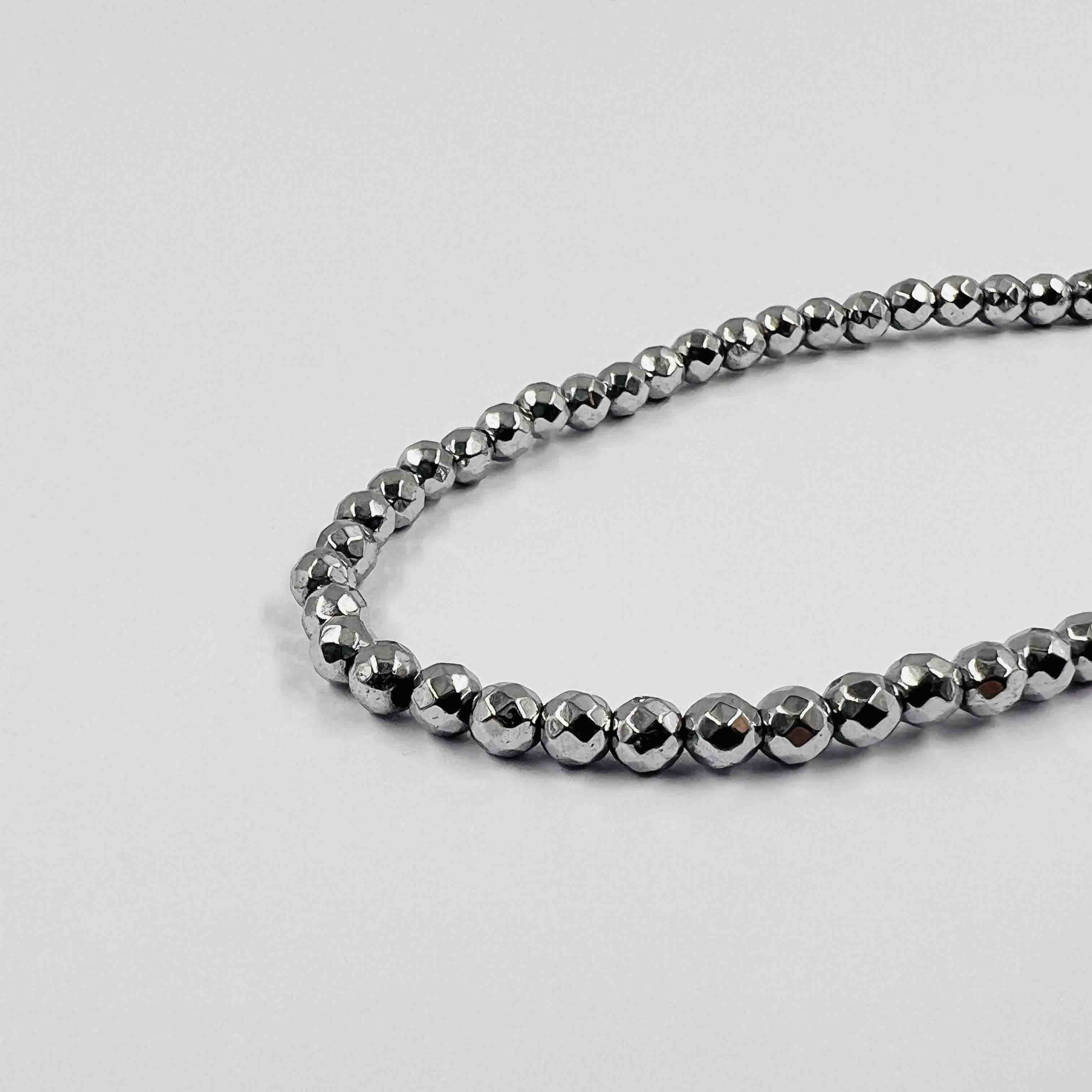 Boule hématite facettée argentée