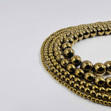 Boule hématite dorée