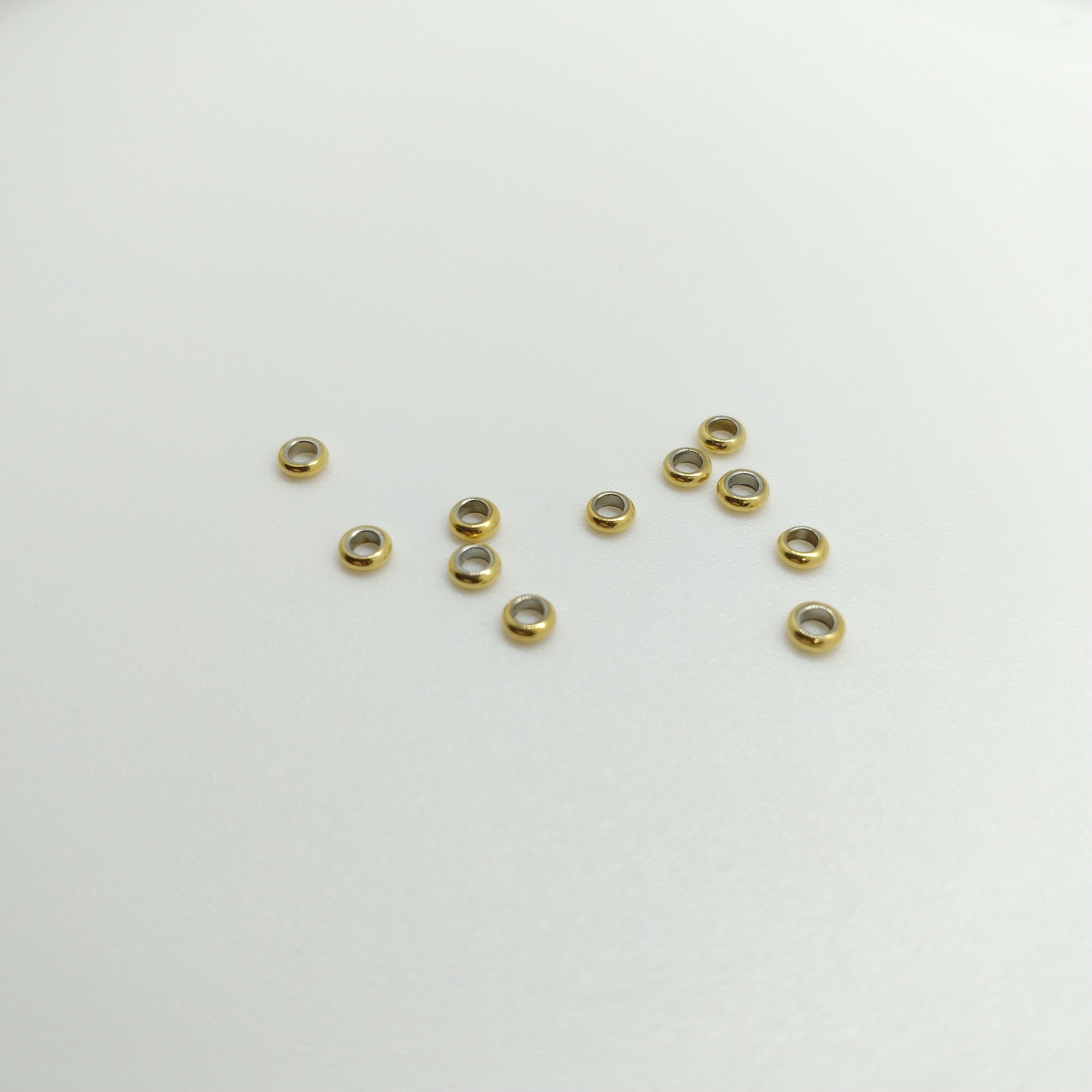 Perles à écraser acier doré x20