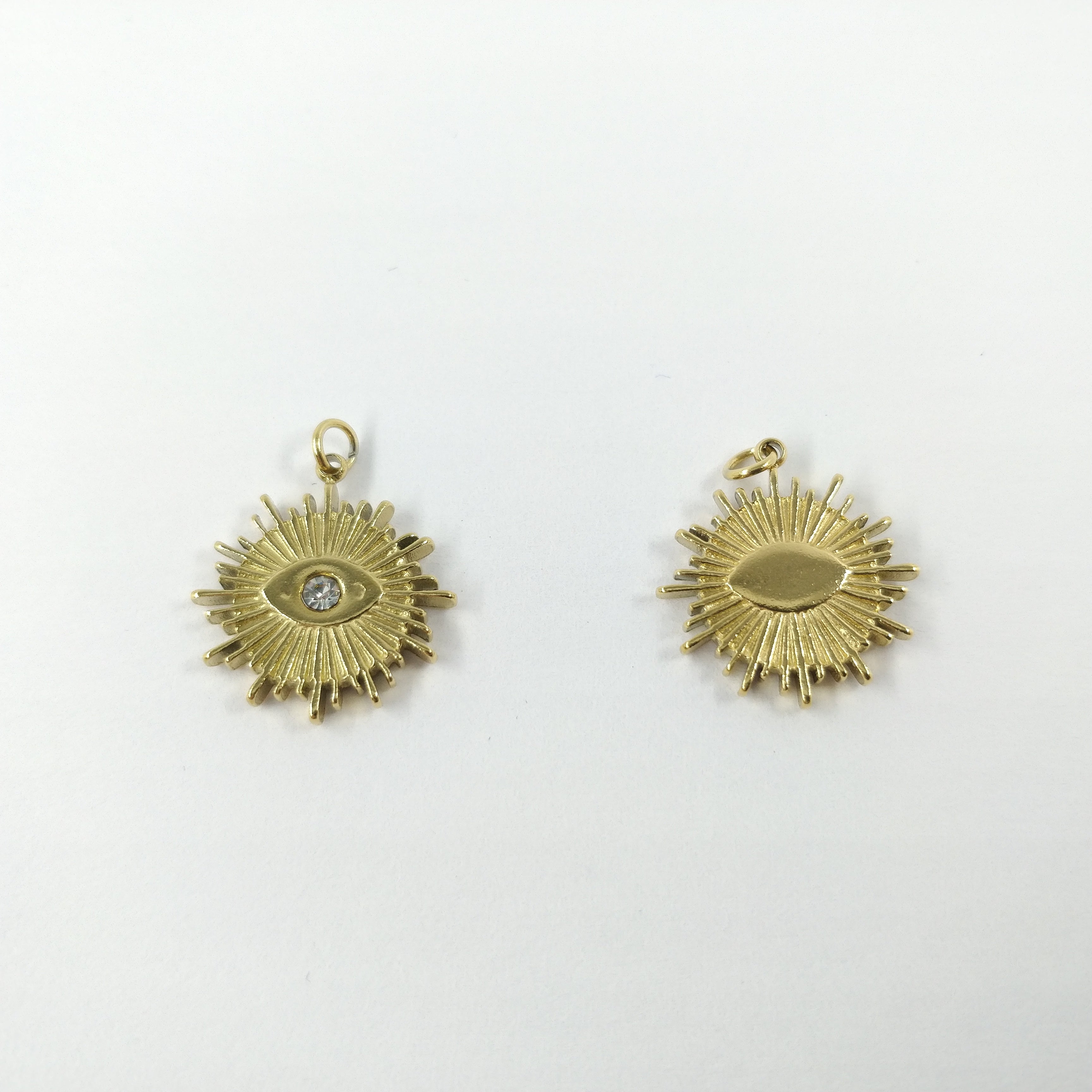 Œil soleil avec strass