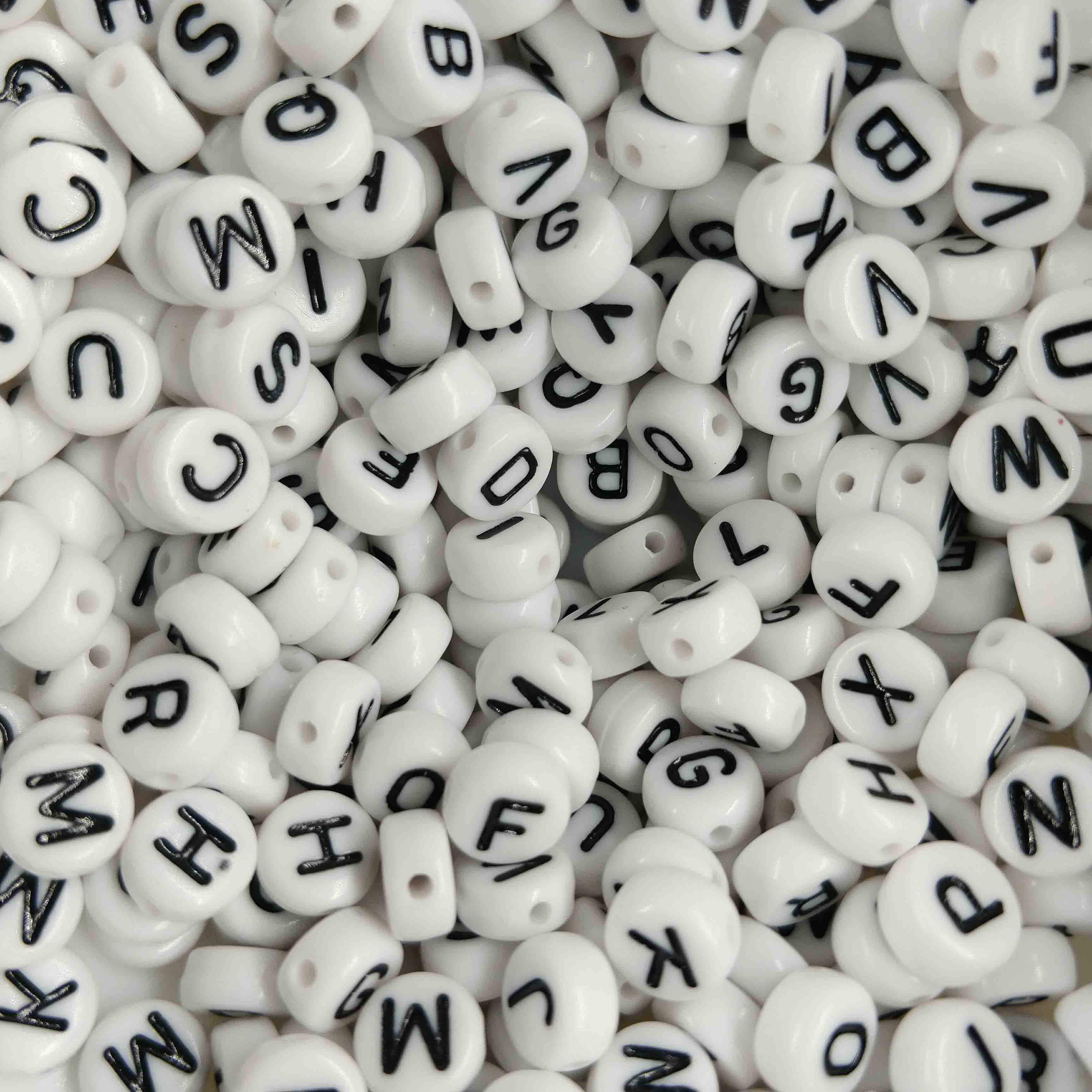 Perle lettre ronde