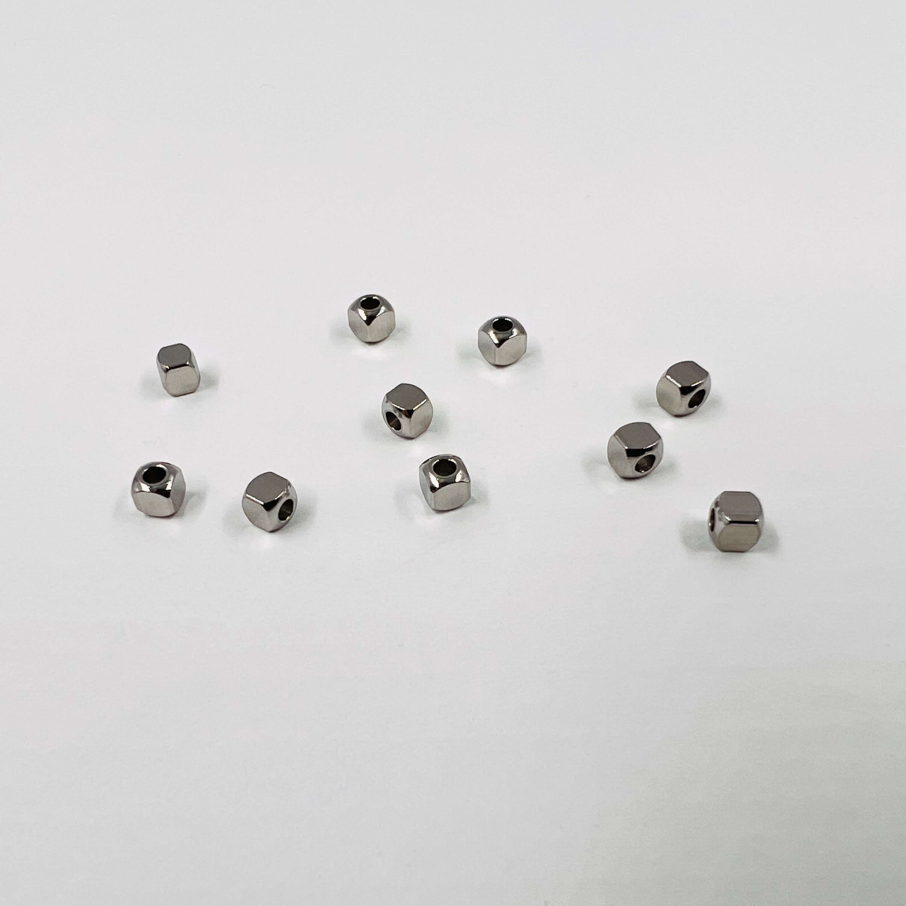 Cubes acier/doré x10