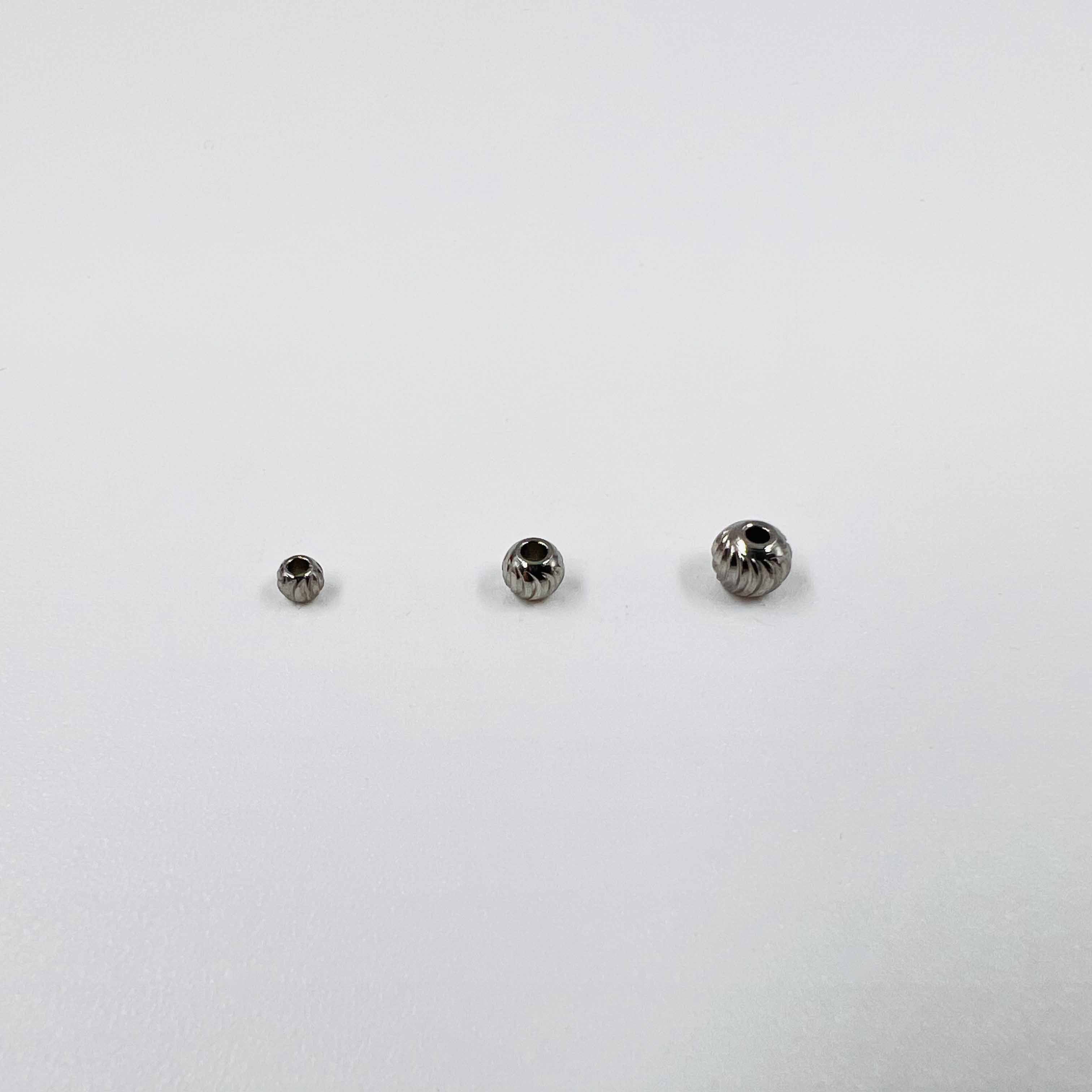 Boules ciselées acier x5