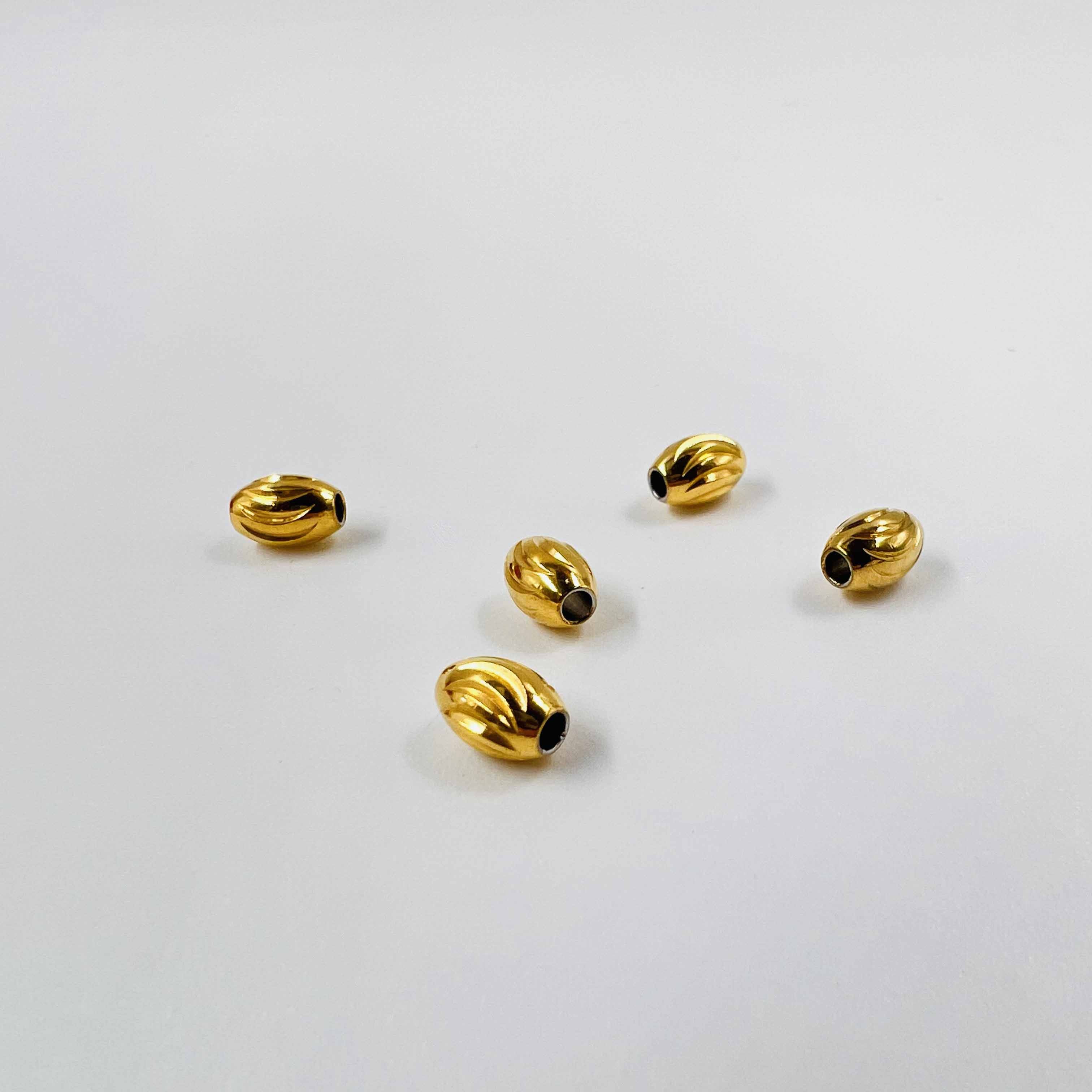 Olives ciselées dorées x5