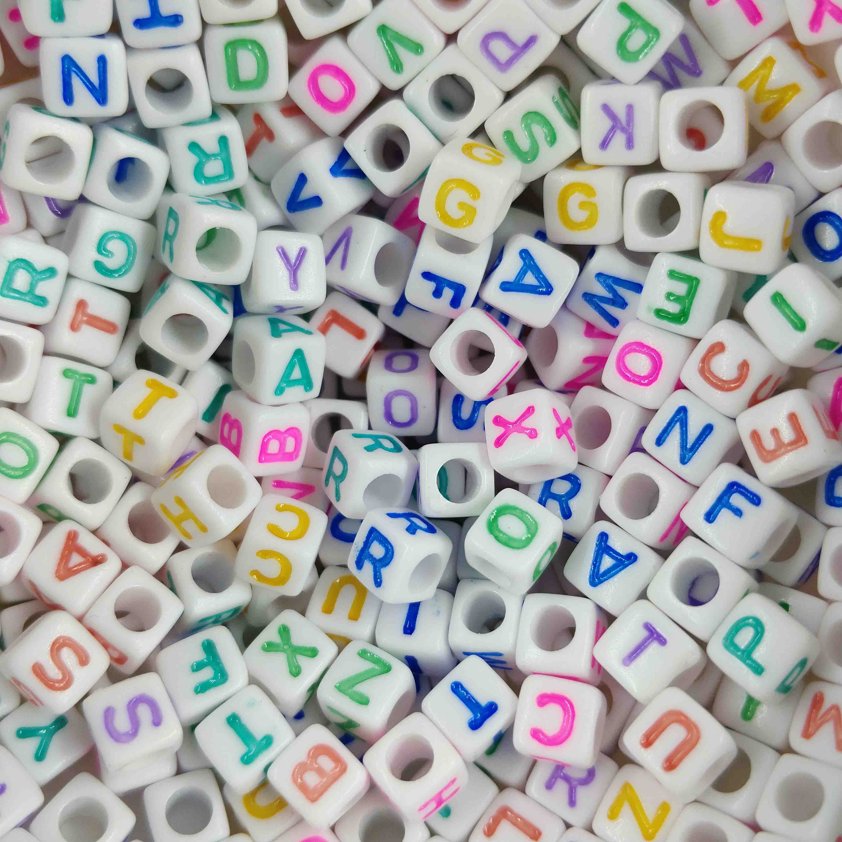 Perle lettre cube
